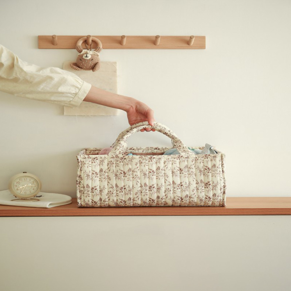 Organisateur de couches à fleu - Baby Nursery Must Haves avis et prix